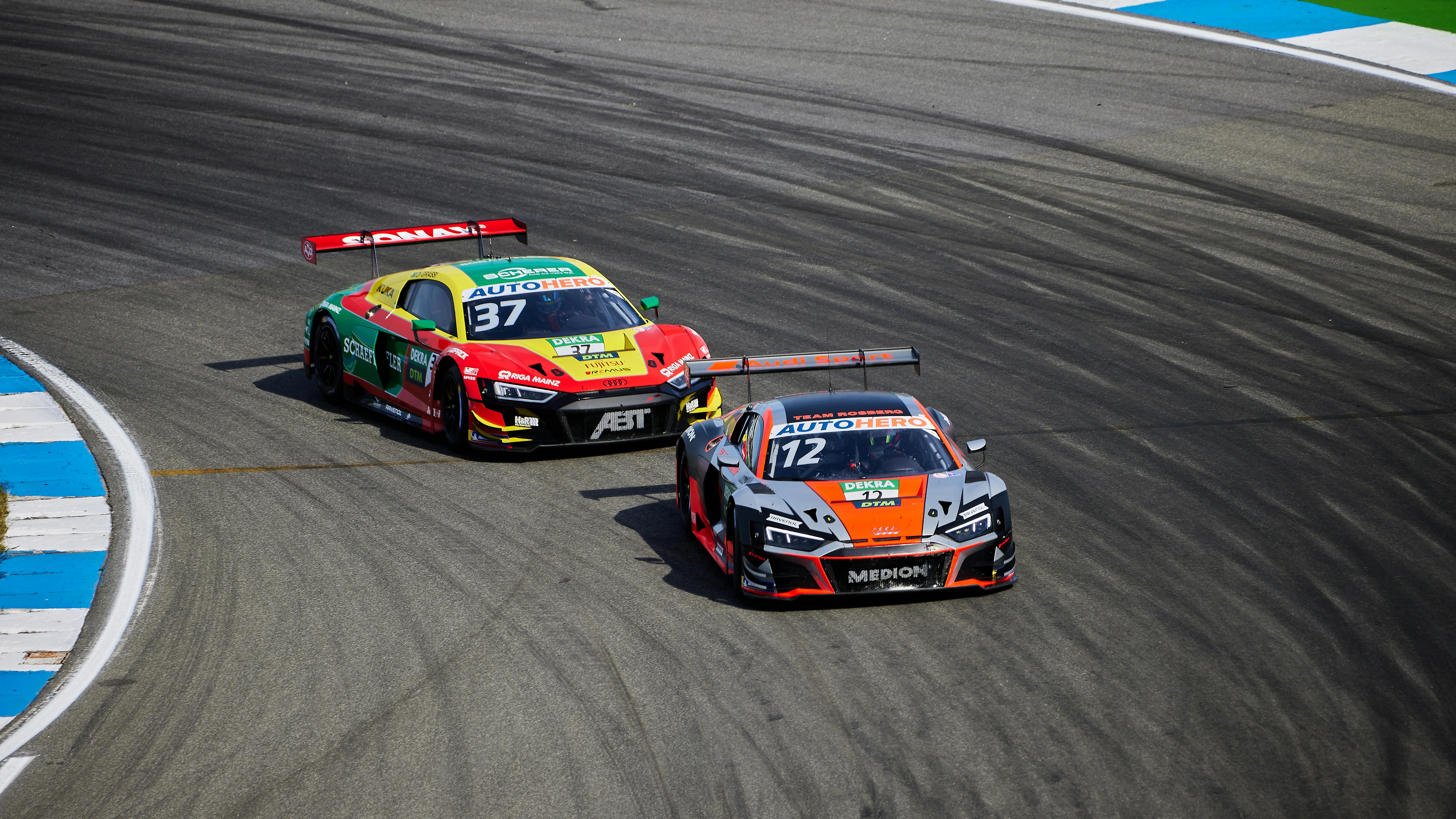 Two race cars speeding on track, DTM racing, high speed